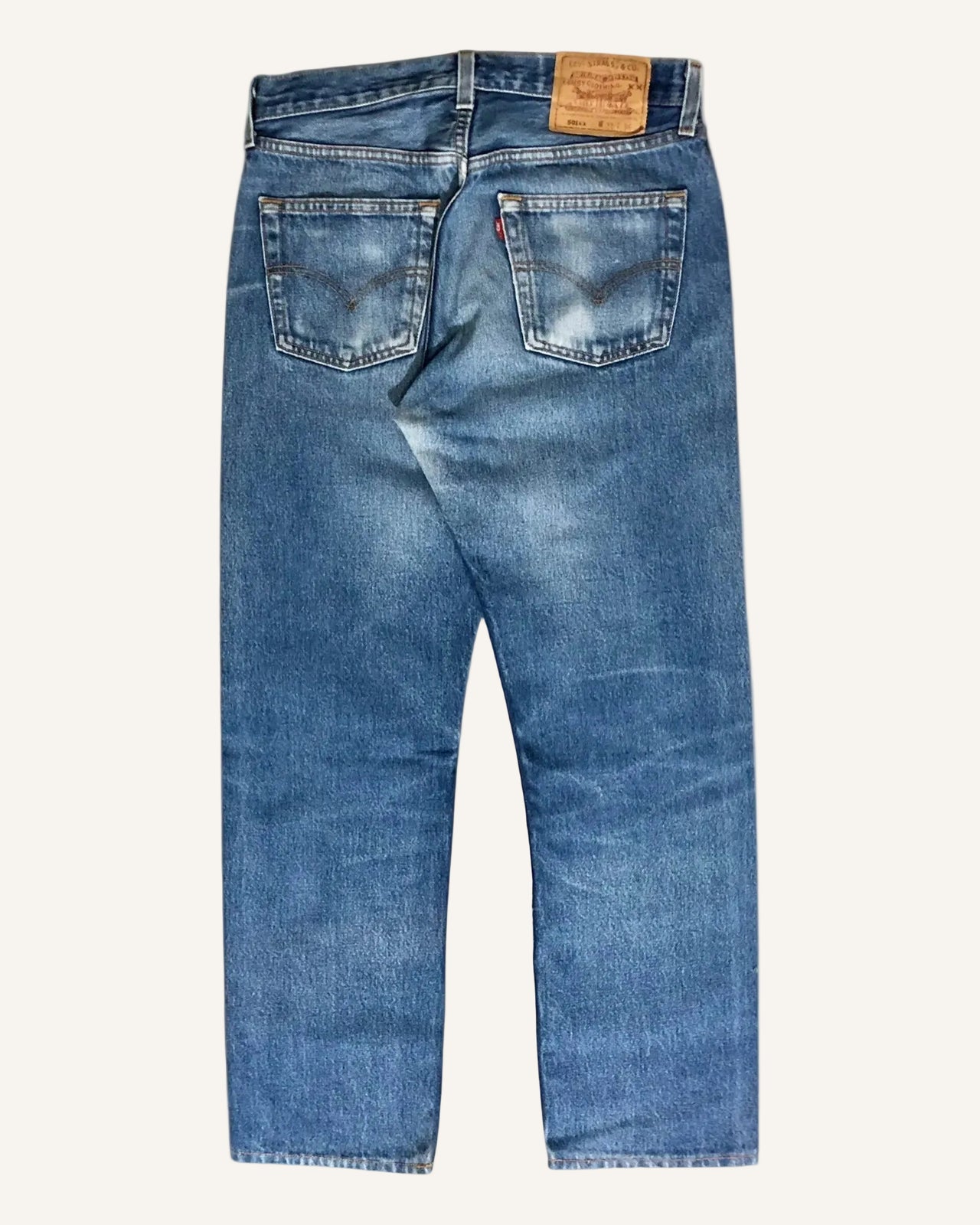 Pair of blue jeans on a white background